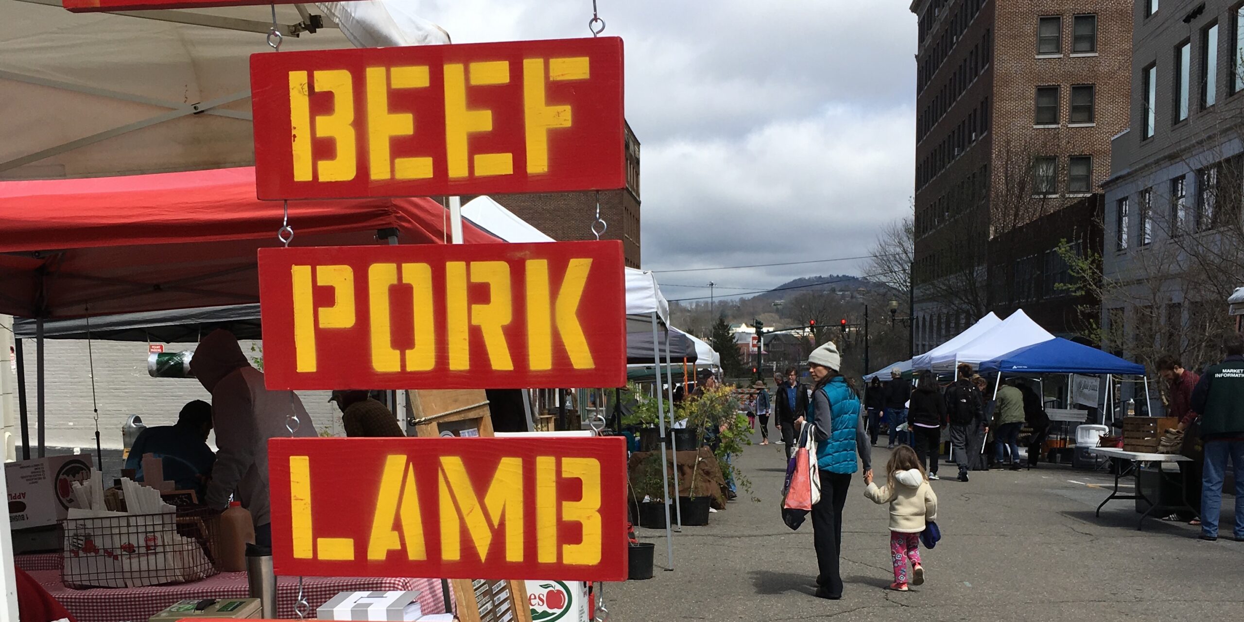 Sign for beef, pork, and lamb at Asheville City Market