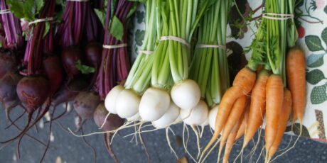 beets, turnips, carrots at a farmers market