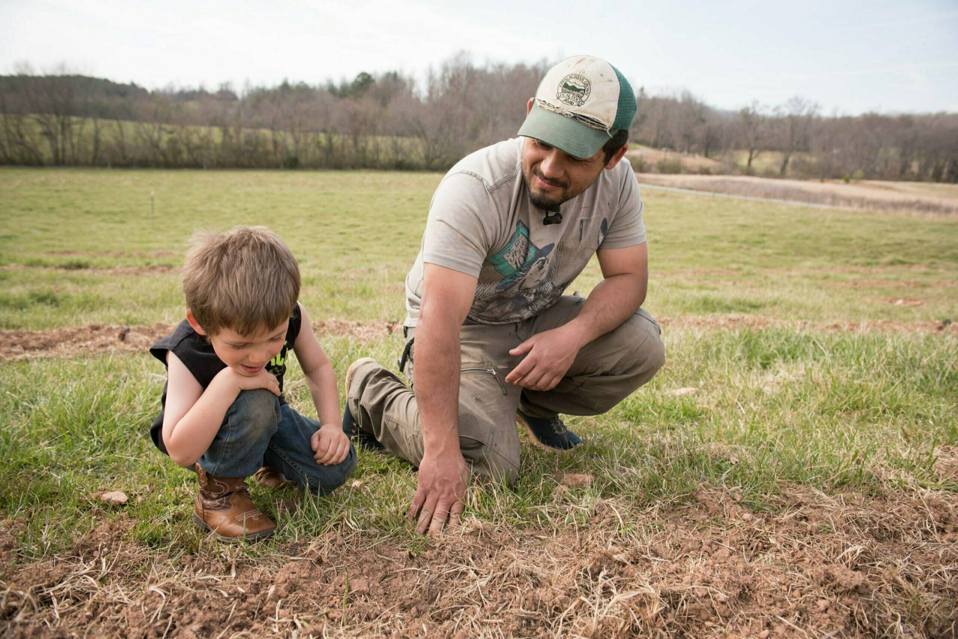 Salvador Moreno and his son at Moreno Family Farm in Clay County, photo by Camilla Calnan Photography